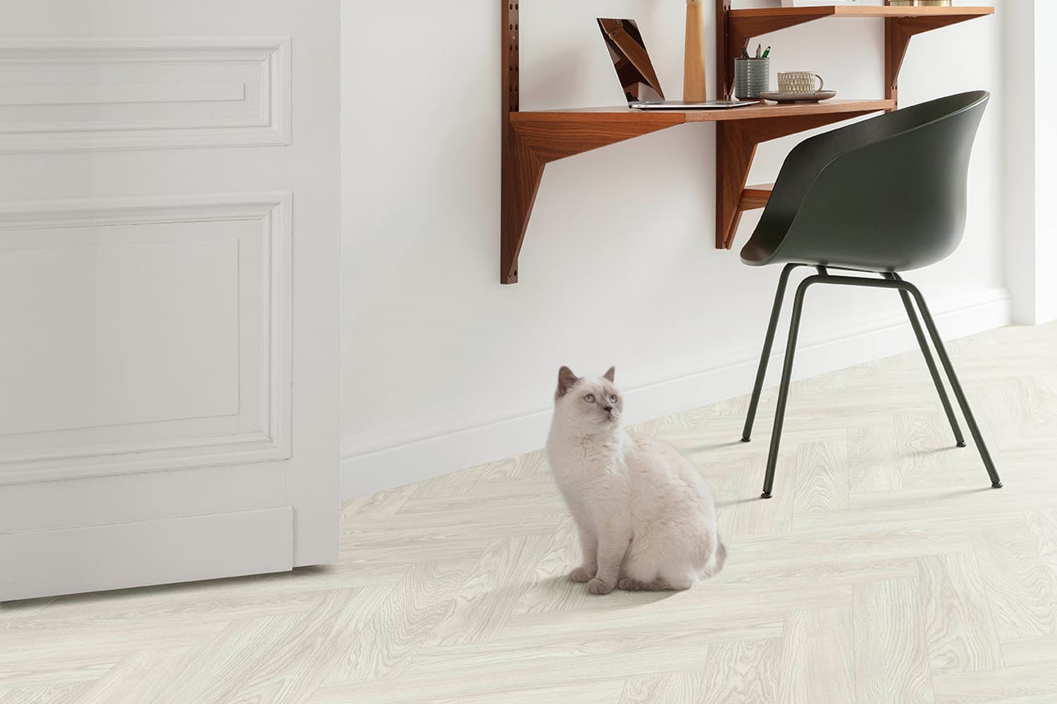 Interior image of a living space with cat - Laurel Oak 51104 - herringbone floor - light wood floor